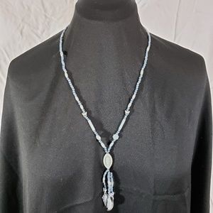 Long blue and cream acrylic bead necklace